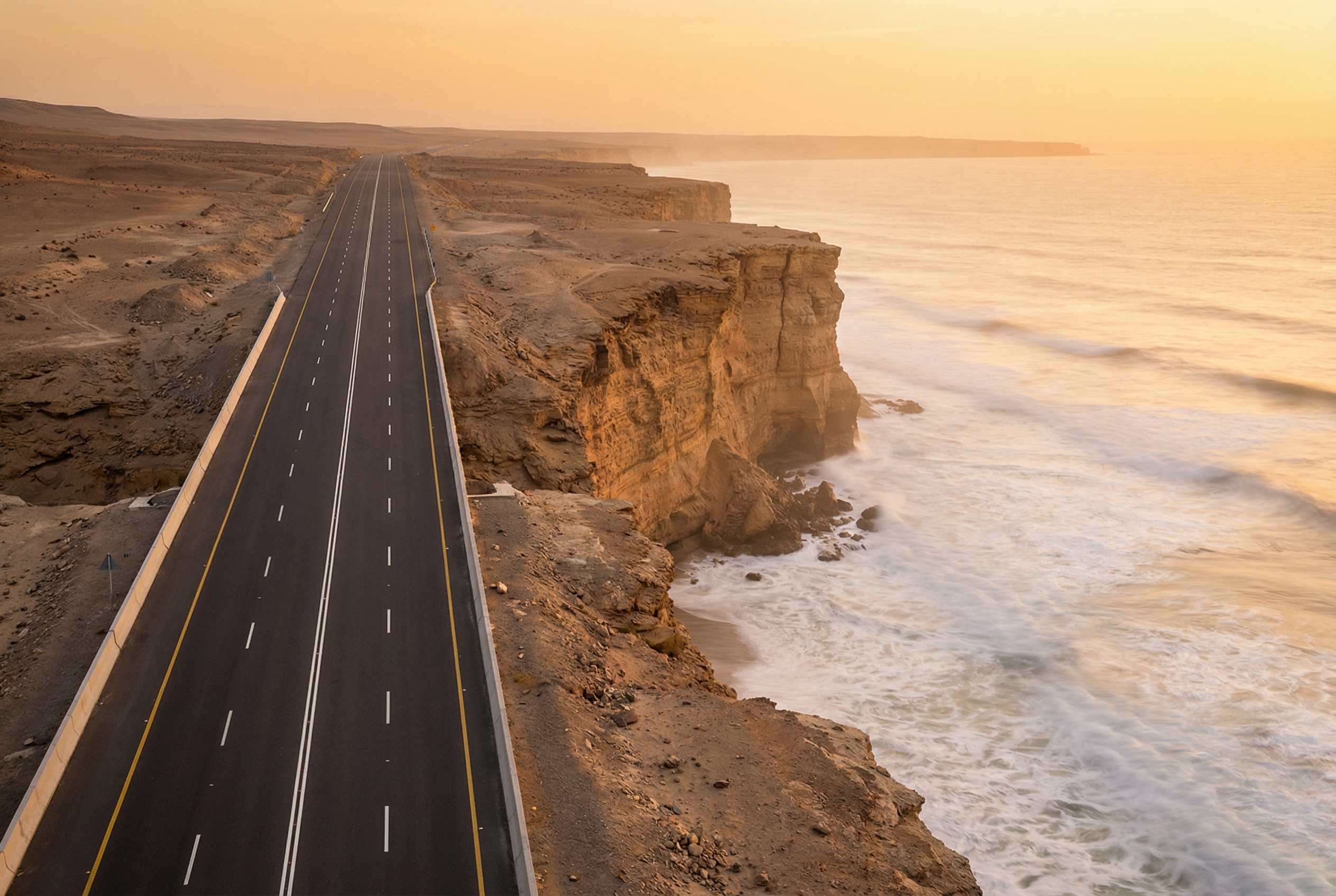 A perfectly engineered highway ending abruptly at an ocean cliff — where formalization meets irreducible judgment